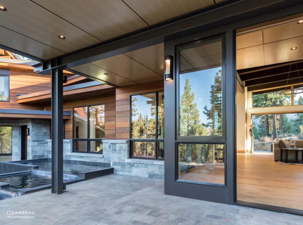 SANDBOX-CLEAR-CREEK-TAHOE-252-MOUNTAIN-MODERN-CONTEMPORARY-HOME-ENTRY-CUSTOM-PIVOT-DOOR-WATER-FEATURE-EXPOSED-STEEL-STRUCTURE image