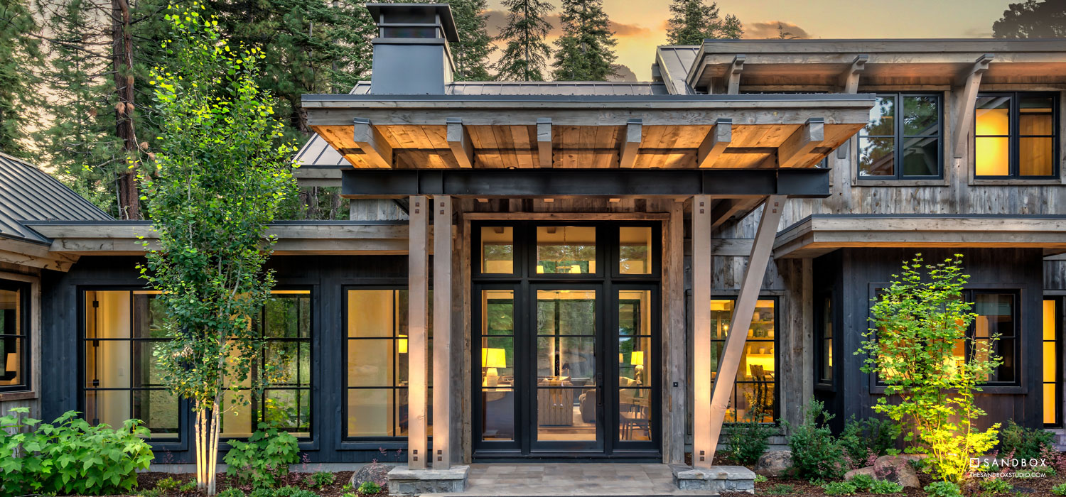 SANDBOX-MARTIS-CAMP-10-MOUNTAIN-TRANSITIONAL-ENTRANCE-EXPOSED-STEEL-WOOD-RAFTERS-GRAND-ENTRY-FEATURE image